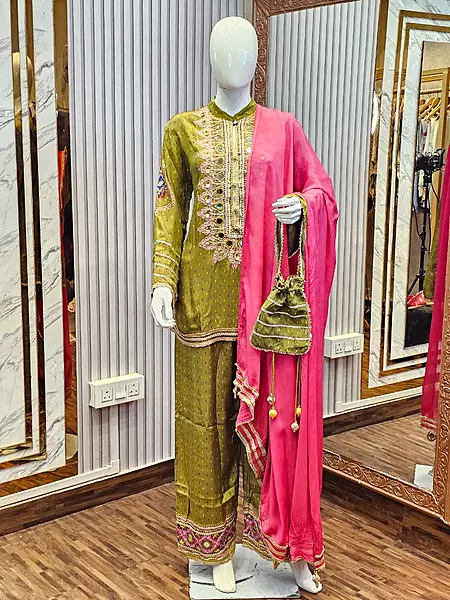 BEAUTIFUL PARROT GREEN SUIT SET WITH POTLI AND EMBELLISHED HANDWORK