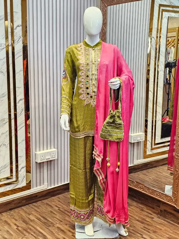 BEAUTIFUL PARROT GREEN SUIT SET WITH POTLI AND EMBELLISHED HANDWORK